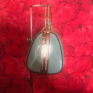 Mint green patent leather handbag